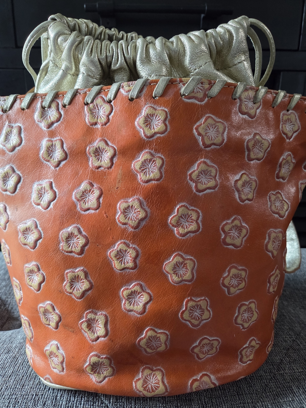 PULICATI Orange Floral Embossed Leather Bucket Bag with Gold Drawstring - Picture 4 of 13